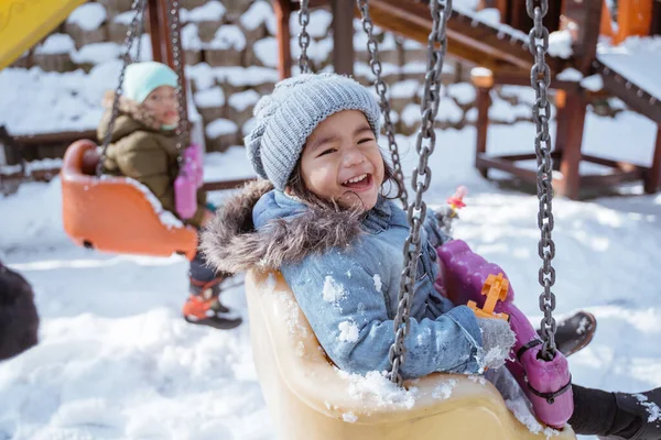 Close Portrait Cute Little Girl Smiling While Swinging Playground Full — 스톡 사진