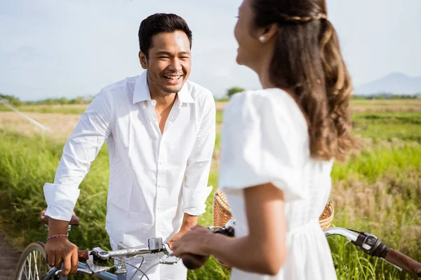 Excited Asian Young Couple Enjoy Riding Bike Together Outdoor — Stockfoto