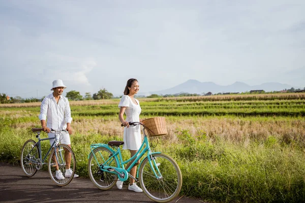 Beautiful Asian Young Couple Wearing White Dress Enjoy Riding Bicycle — Photo