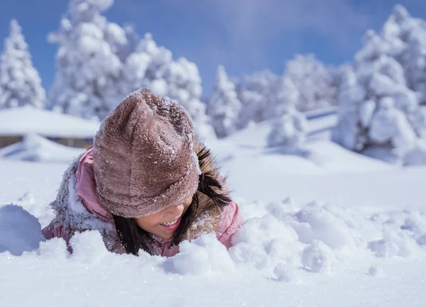 Happy Little Girl Burried Half Her Body While Playing Snow — 스톡 사진