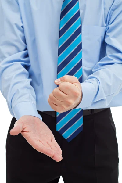 Businessman hitting his palm — Stock Photo, Image