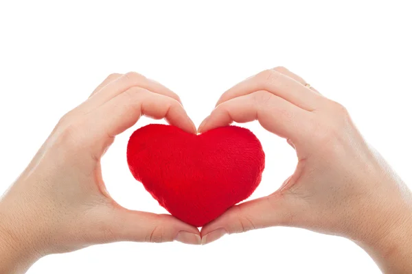 Female hands holding heart Royalty Free Stock Photos