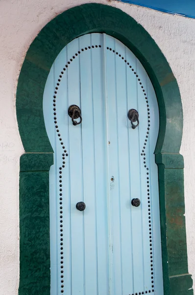 Tunisian blue door — Stock Photo, Image