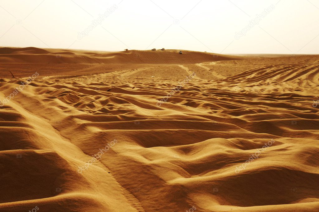 Jeeps on the dunes of Sahara desert