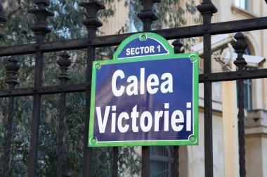 Calea Victoriei Road Sign Post in Bucharest Romania clipart