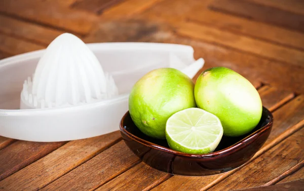 Fresh citrus lime wholes and slice prepare for squash — Stock Photo, Image