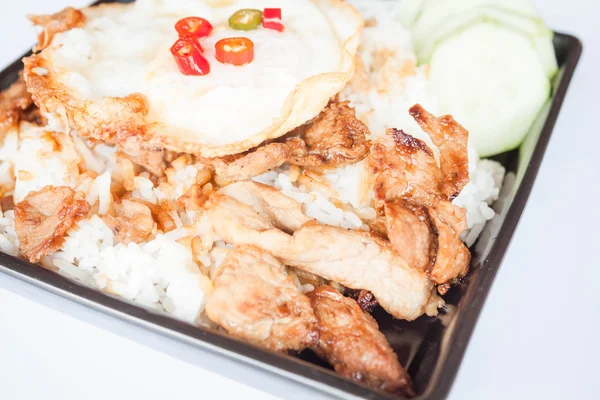 Egg fried and fried pork garlic with soy sauce topped on rice — Stock Photo, Image