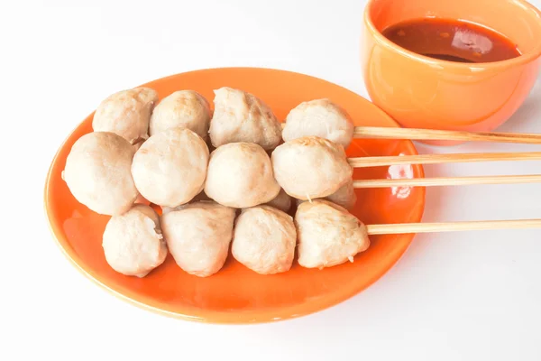 Mini pork balls in orange dish on clean table — Stock Photo, Image