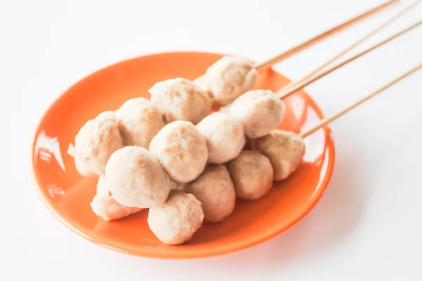 Mini pork balls in orange dish on clean table — Stock Photo, Image