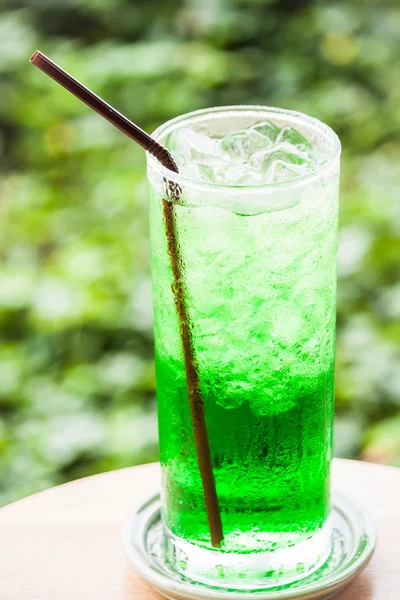Fresh sweet green drink with ice cubes — Stock Photo, Image