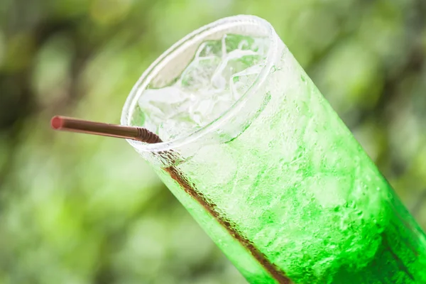 Refreshing glass of non alcohol cold green drink — Stock Photo, Image