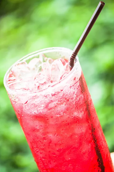 Refreshing glass of non alcohol cold red drink — Stock Photo, Image
