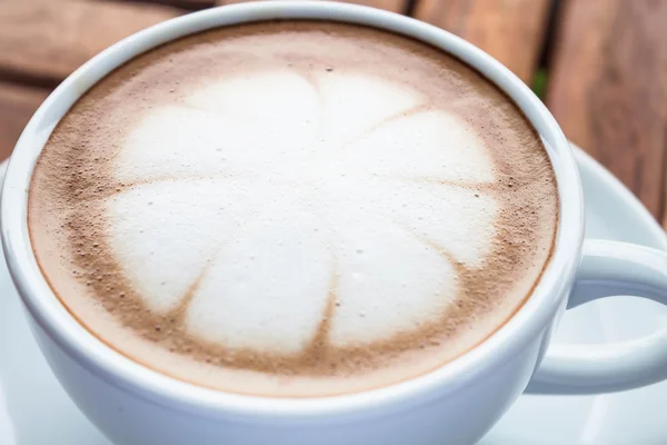 Milk microfoam topped on hot cafe mocha cup — Stock Photo, Image