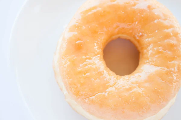 Close up classic donut serving on white dish — Stock Photo, Image