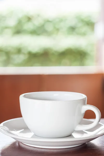 Primer plano de una taza de café en la cafetería —  Fotos de Stock