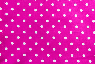 pembe bir arka plan üzerinde beyaz noktalar