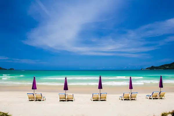 Beach chairs on sand beach — Stock Photo, Image