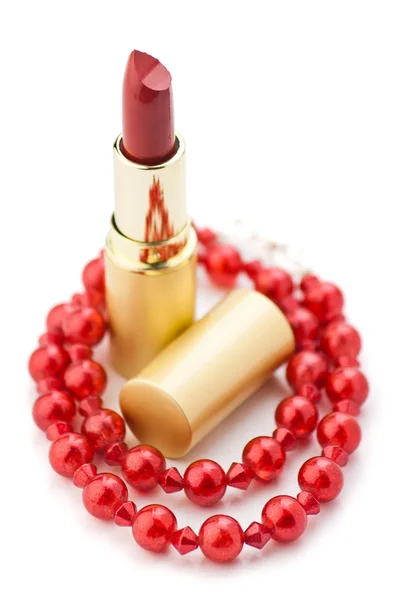 Lpstick и красные украшения — стоковое фото