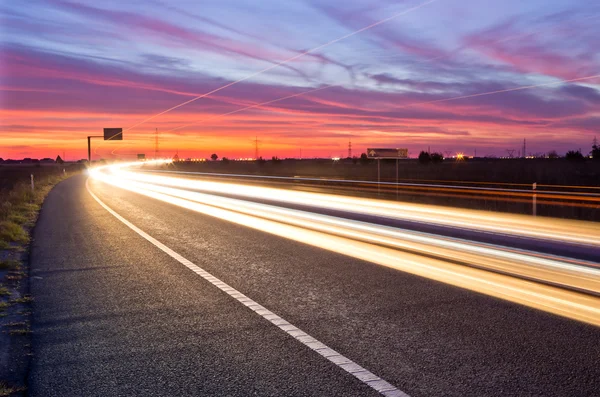 Zonsondergang verkeer — Stockfoto