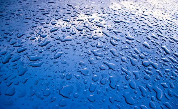 Blue water drops and reflection — Stock Photo, Image