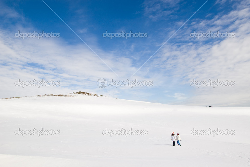 children on snowy mountain