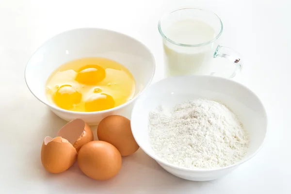 Eggs flour and milk — Stock Photo, Image