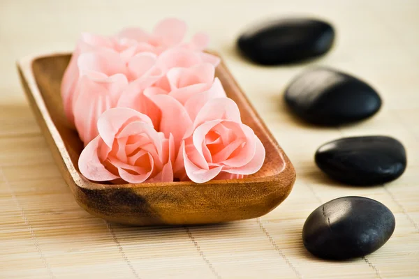 Spa stones and soap flowers — Stock Photo, Image