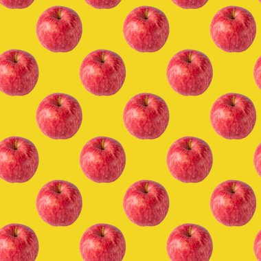 Duvar kağıdı ya da ambalaj kağıdı için parlak sarı arka planda kırmızı elmalı kusursuz desen, sonbahar hasadı.
