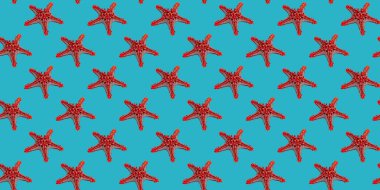 Duvar kağıdı, kumaş ya da ambalaj kağıdı için turkuaz arka planda kusursuz kırmızı deniz yıldızı deseni