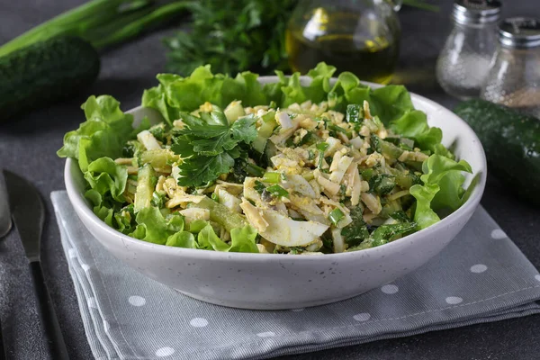 Salad Squid Cucumbers Boiled Eggs Cheese White Bowl Green Lettuce — Fotografie, imagine de stoc