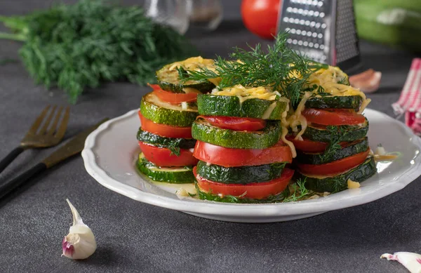 Baked Zucchini Tomatoes Cheese Garlic White Plate Dark Gray Background — ストック写真