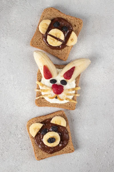 Three Sweet Toasts Kids Shape Bear Rabbit Monkey Strawberries Banana — Fotografie, imagine de stoc