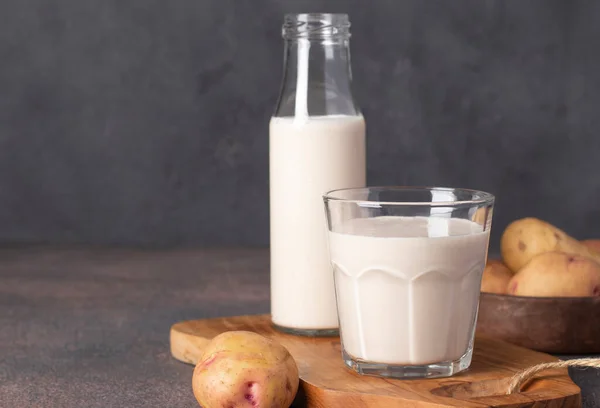 Vegan Potato Milk Bottle Glass Well Potatoes Plate Gray Background — Foto de Stock