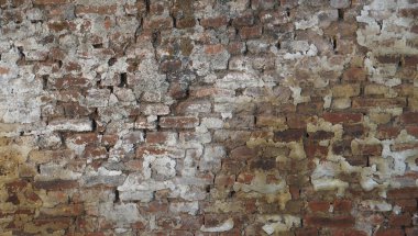 Güzel bir tuğla duvar dokusu geleneksel duvar dokusunun detaylarını gösterir. Eski bina duvar dokusunun yüzeyi.