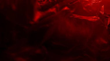 Kırmızı neon ışık desenli plastik doku. Kaplama ve etki için gerçekçi plastik doku. Yaratıcı ve dekoratif tasarım için modaya uygun plastik desen.