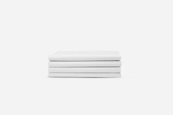 Μια Τακτοποιημένη Στοίβα Από Διπλωμένα Λευκά Υφάσματα Καλά Σχεδιασμένο Λευκό — Φωτογραφία Αρχείου