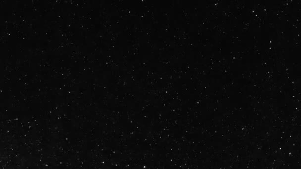 夜空を背景に輝く星の粒子アニメーション 空に輝く星の光 暗闇の中で粒子をちらつき — ストック動画