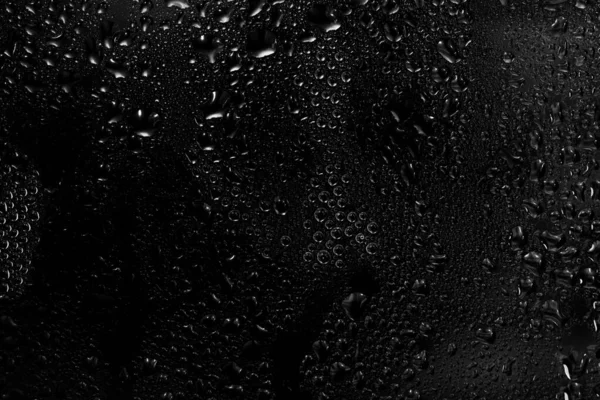 Wassertropfen Auf Schwarzem Hintergrund Abstrakte Tau Wassertröpfchen Auf Einem Fensterglas — Stockfoto