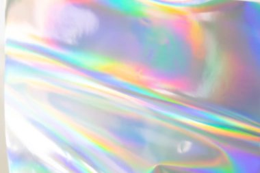 Renkli holografik arka plan. Doku, kapak, duvar kağıdı, baskı vs. için modern Gökkuşağı folyosu. Parlak fütürist bulanık hologram ve soyut eğim renkleri. 
