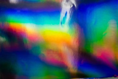 Renkli holografik arka plan. Doku için modern gökkuşağı folyosu, kapak, duvar kağıdı, baskı, dereotu. Koyu fütüristik bulanık hologram ve soyut eğim renkleri. 