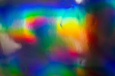 Renkli holografik arka plan. Doku için modern gökkuşağı folyosu, kapak, duvar kağıdı, baskı, dereotu. Koyu fütüristik bulanık hologram ve soyut eğim renkleri. 