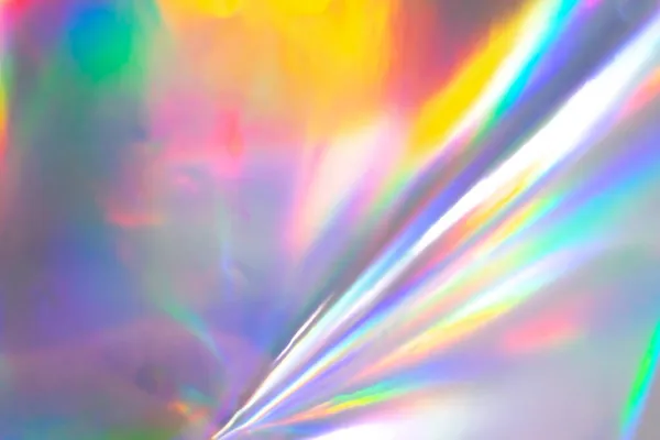 Renkli holografik arka plan. Doku, kapak, duvar kağıdı, baskı vs. için modern Gökkuşağı folyosu. Parlak fütürist bulanık hologram ve soyut eğim renkleri. 