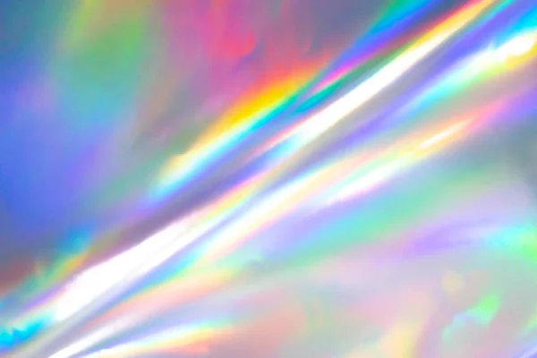 Renkli holografik arka plan. Doku, kapak, duvar kağıdı, baskı vs. için modern Gökkuşağı folyosu. Parlak fütürist bulanık hologram ve soyut eğim renkleri. 