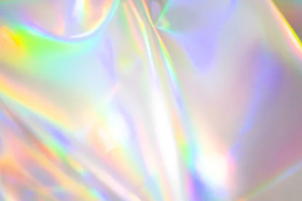 Renkli holografik arka plan. Doku, kapak, duvar kağıdı, baskı vs. için modern Gökkuşağı folyosu. Parlak fütürist bulanık hologram ve soyut eğim renkleri. 