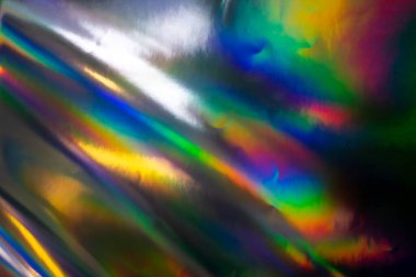 Renkli holografik arka plan. Doku için modern gökkuşağı folyosu, kapak, duvar kağıdı, baskı, dereotu. Koyu fütüristik bulanık hologram ve soyut eğim renkleri. 