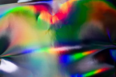 Renkli holografik arka plan. Doku için modern gökkuşağı folyosu, kapak, duvar kağıdı, baskı, dereotu. Koyu fütüristik bulanık hologram ve soyut eğim renkleri. 