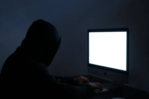 Unidentified Hacker Wearing Black Hoodie Sitting Front White Blank Screen — Foto Stock