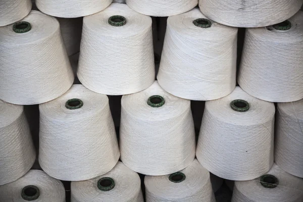 Cotton reels stacked together — Stock Photo, Image