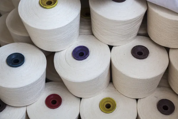 Cotton reels stacked together — Stock Photo, Image