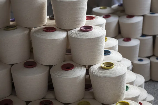 Cotton reels stacked together — Stock Photo, Image